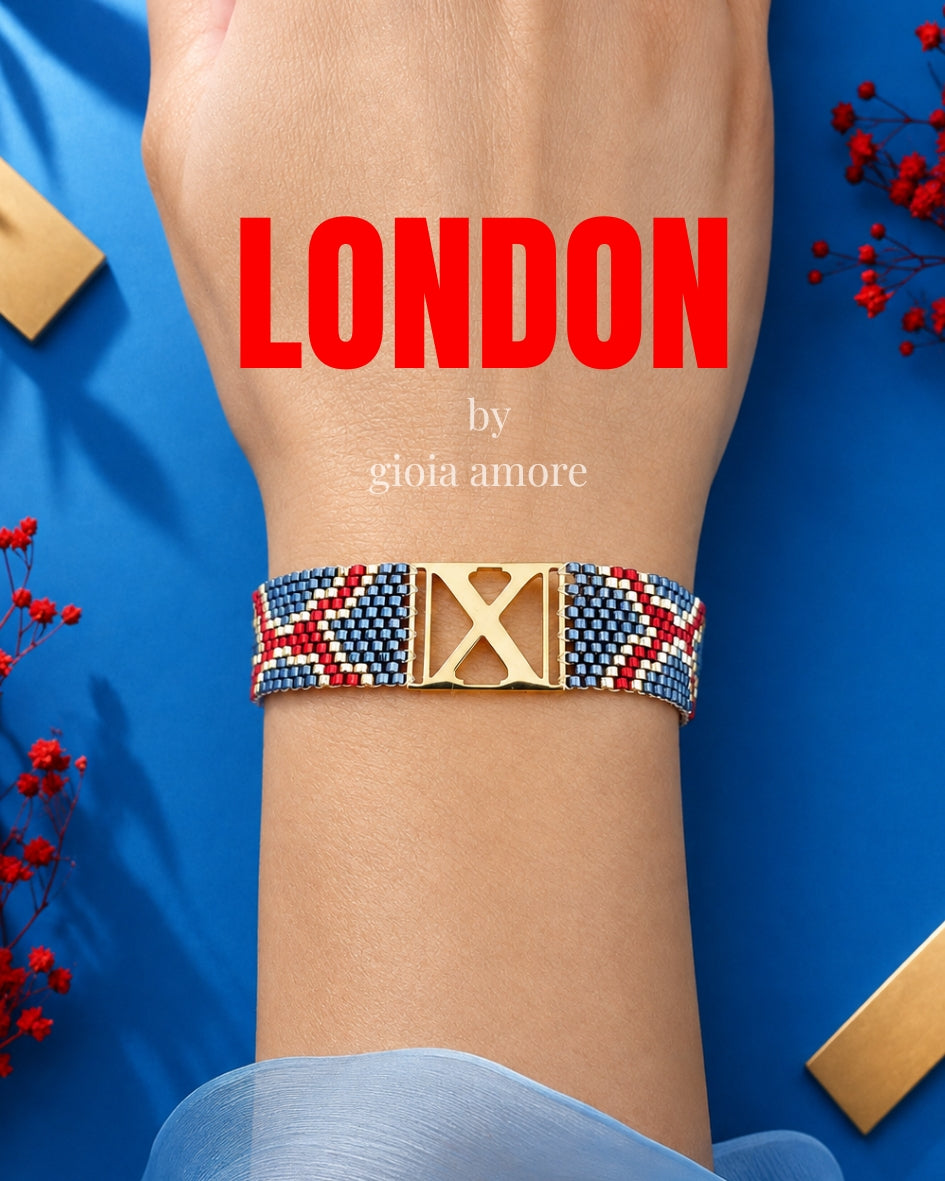 Brătară Miyuki personalizată LONDON, în nuante de negru, rosu profund și auriu, purtată la încheietură